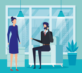 Obraz premium business couple workers calling with cellphone in the livingroom