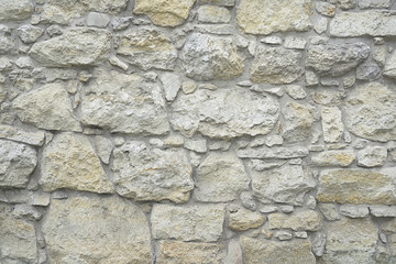 Grey stone mosaic wall background