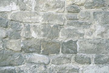 Grey stone mosaic wall background