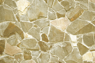 Beige stone mosaic wall background
