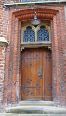 Beautiful wooden door in the street of old town, Bremen, Germany