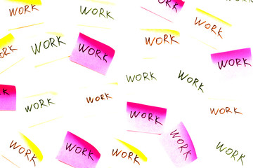 Repeating pattern from the word "work" on a white background with multi-colored lines.