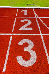 Running track at the stadium, color is orange brick,High resolution
