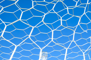 The nets of football goal with field artificial grass 