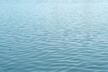 close up ocean water background , blue water ripples texture