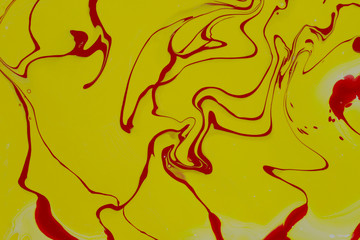 Abstract blurred yellow background with red acrylic fill. Cropped shot, horizontal, closeup, horizontal. Design concept