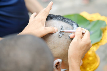 Closeup shot of Shaved hair for ordained Buddhist man