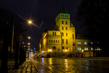 Fototapeta na wymiar Night street on a rainy day in Wroclaw. Poland