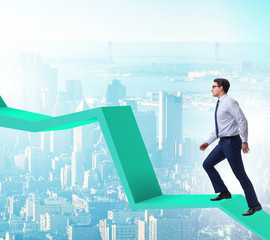 Businessman supporting growtn in economy on chart graph