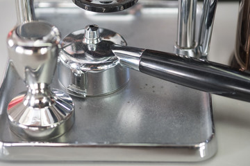 Portafilter silver color with black handle for coffee machine