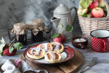 Fototapeta na wymiar Fresh homemade pancake with apples, honey and cinnamon
