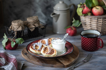 Fresh homemade pancake with apples, honey and cinnamon