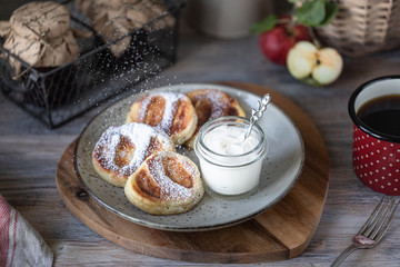 Fresh homemade pancake with apples, honey and cinnamon