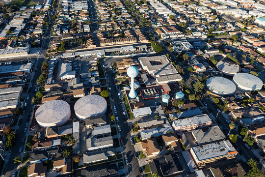 Aerial of view of homes, streets and watertower in the Hawthorne neighborhood of Los Angeles County, California.