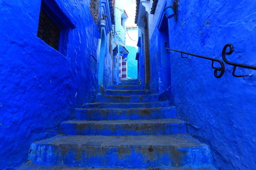 Blue street walls of the popular city of Morocco, Chefchaouen. Traditional moroccan architectural details. - 281641066