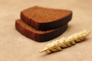 Ripening greenish-yellow ears of wheat.