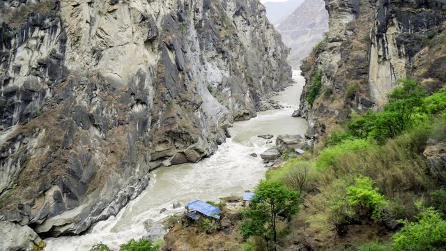 Tiger Leaping Gorge. Canyon or valley of Jinsha River (upper Yangtze River). Deepest and most spectacular river canyons in the world at Lijiang, Yunnan, China. landmarke of the trek and hiking through
