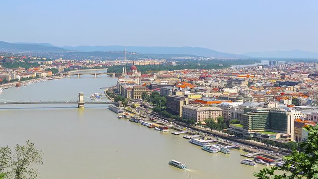 Budapest city skyline, historic district with parliament building and Danube river in Hungary, time lapse panoramic motion