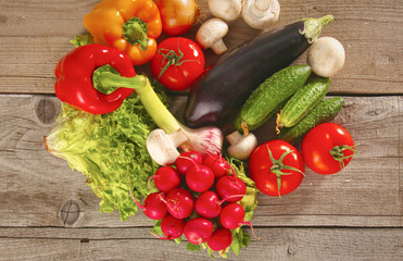 Fresh vegetables on a clean wooden table