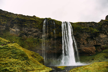 Fantastic Seljalandsfoss waterfall in Iceland during sunny day.