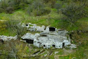 The unique temple of the cave city Tepe-Kermen, near the city of Bakhchisaray, Crimea. Aerial drone...
