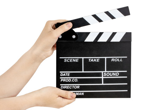 Hands holding clapper board  isolated on white with clipping path