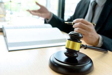 Judge or lawyer talking  with team