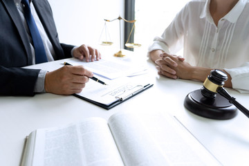 Judge or lawyer talking  with team or client