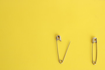 sewing pin on colorful background