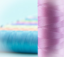 Sewing threads of different colors.