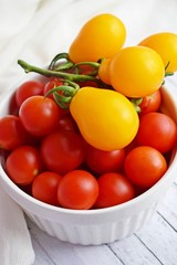 Fresh,ripe tomatoes on a wooden background.Healthy diet.