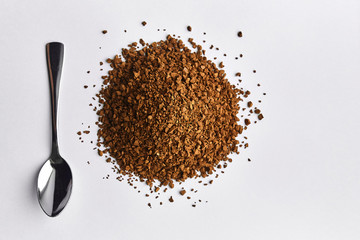 instant coffee on a white background, cutlery, spoon.