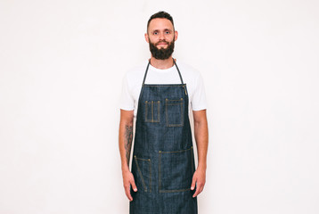 Portrait of a happy young crazy chef cook isolated on a white background