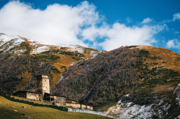 Fototapeta premium Lamaria old church in village Ushguli Upper Svaneti region in autumn, Georgia