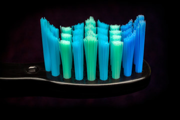 toothbrush on black background close-up
