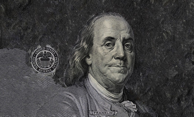 Benjamin Franklin on copied blured background