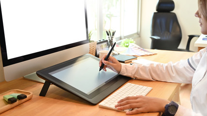 Graphic designer woman working on creative office with create graphic on computer.
