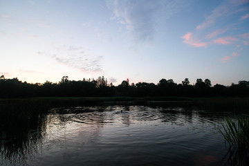Beautiful countryside evening sunset view of river Venta flowing through the city.