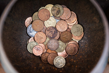 Thailand's coin in the bowl. 