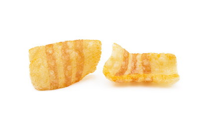 Fried wheat-potato snack with smoked bacon flavor isolated on white background