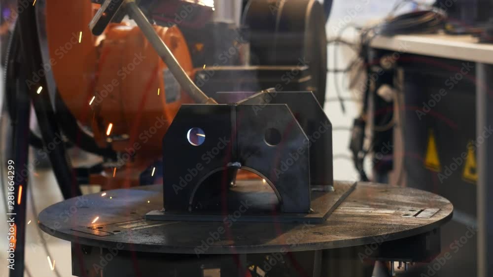 Poster the sample of the robot arm during welding process, automatic work, technology and industrial concep