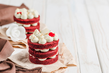 Obraz na płótnie Canvas Biscuit cake Red Velvet with white Belgian chocolate cream