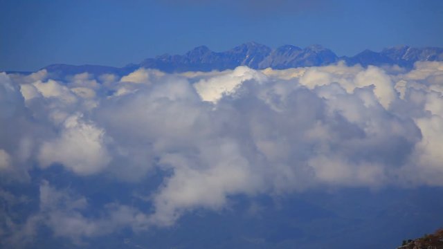 View of Mount Yuhata with hikers&nbsp;from Yuno Maruyama,  Tomi,  Nagano,  Japan