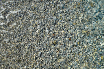 Sea pebbles. Small stones gravel texture background. Pile of pebbles, thailand.Color stone in background.