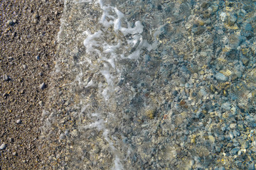 Sea pebbles. Small stones gravel texture background. Pile of pebbles, thailand.Color stone in background.