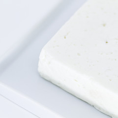 piece of cheese on white background