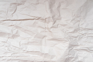 Background of a crumpled wrapping paper.