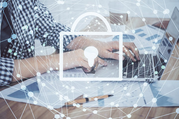 Double exposure of lock icon with man working on computer on background. Concept of network security.