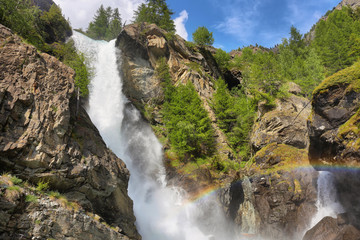 Lillaz waterfall among rocks, Aosta Valley, Italy