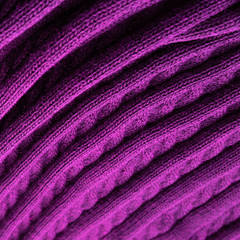 Obraz na płótnie Canvas The texture of fine wool fabric for banners. Soft Wool Folds